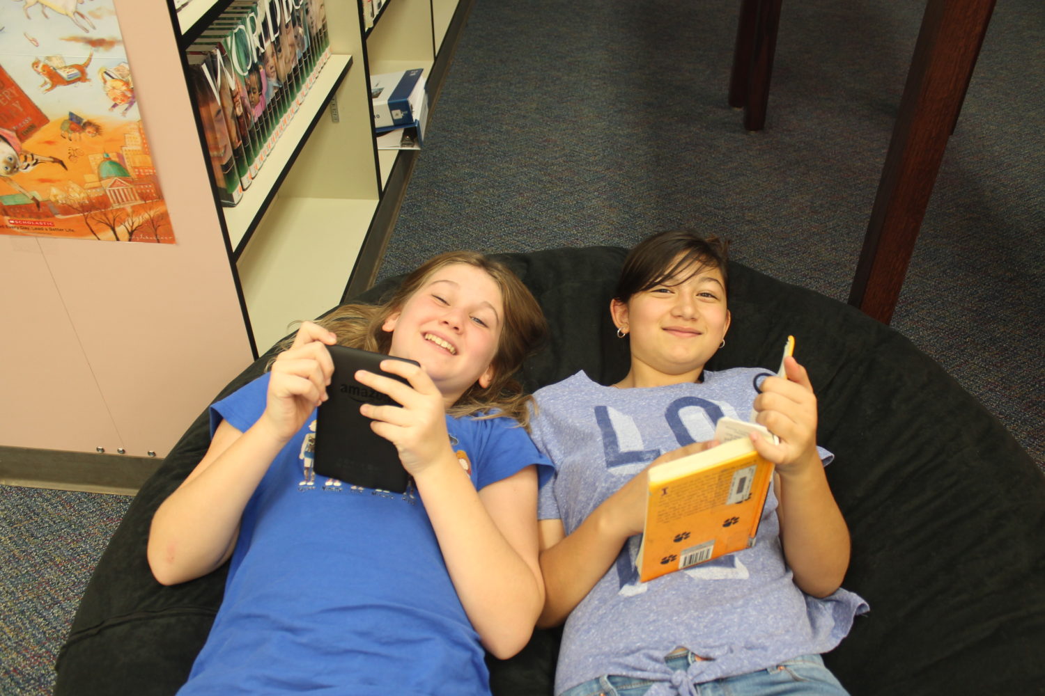 Collins students enjoy reading in the library.