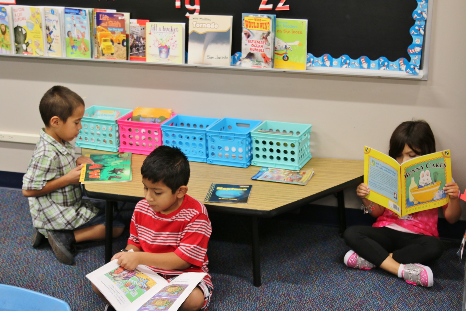 San Jacinto Elementary students enjoy reading with friends.