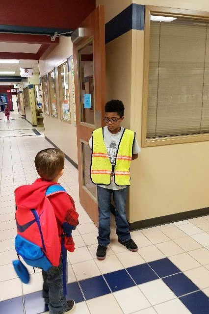 Ford Elementary safety patrol lends a helping hand.