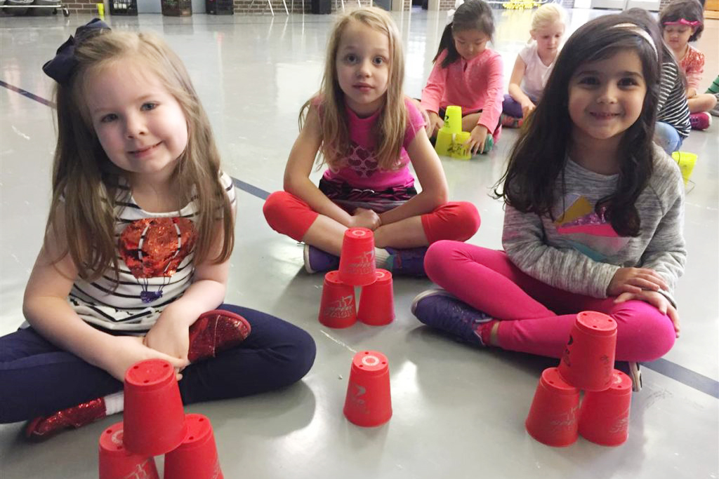 Galatas kindergarten students enjoyed learning the basics of cup stacking in PE.