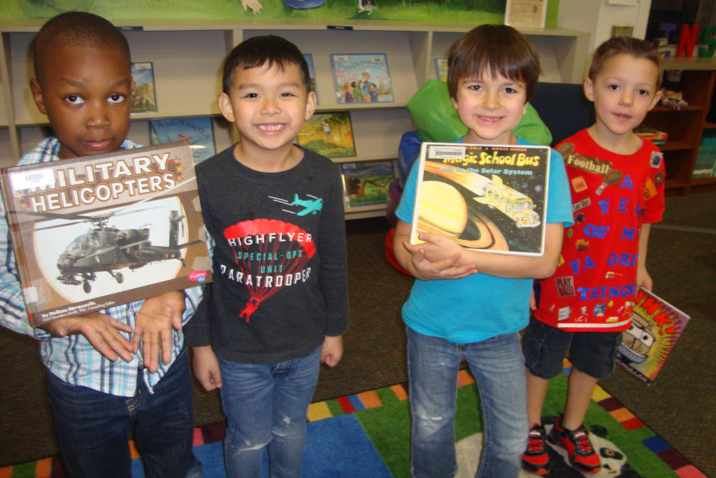 Kindergarten students at Giesinger love to check out library books.