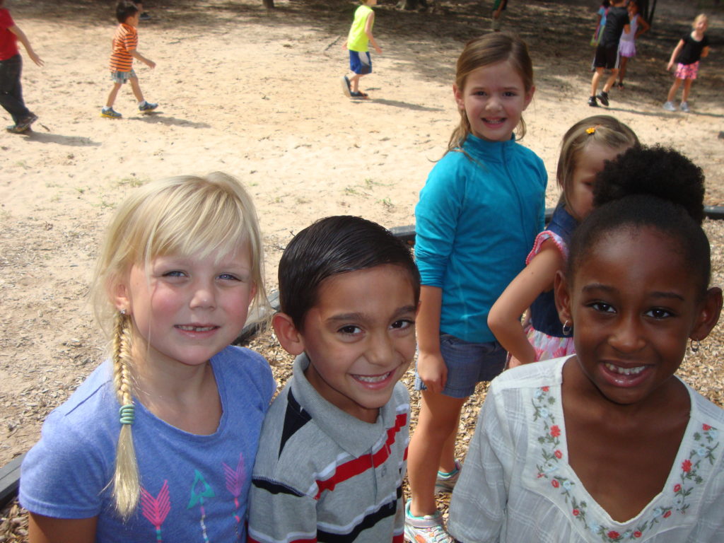 First graders at Giesinger enjoyed the warm weather while on the playground.