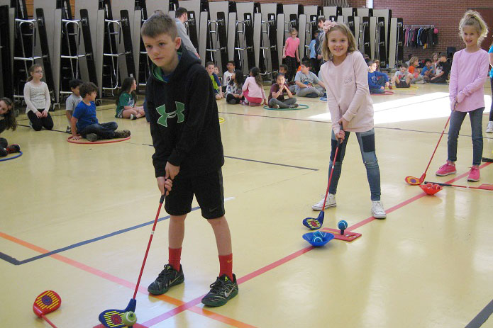 Second graders at Bush had fun learning how to golf in PE.
