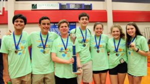 A Destination Imagination team from the Academy of Science & Technology poses with their 1st place trophy and medals.
