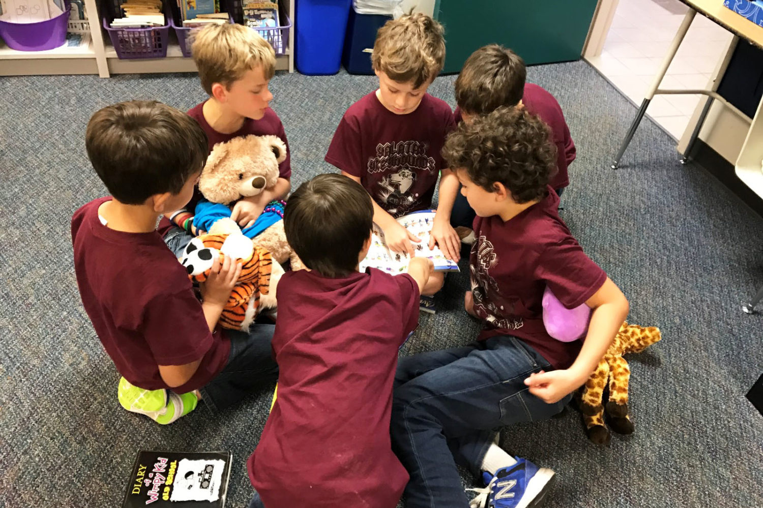 Galatas second graders spend time reading with friends.