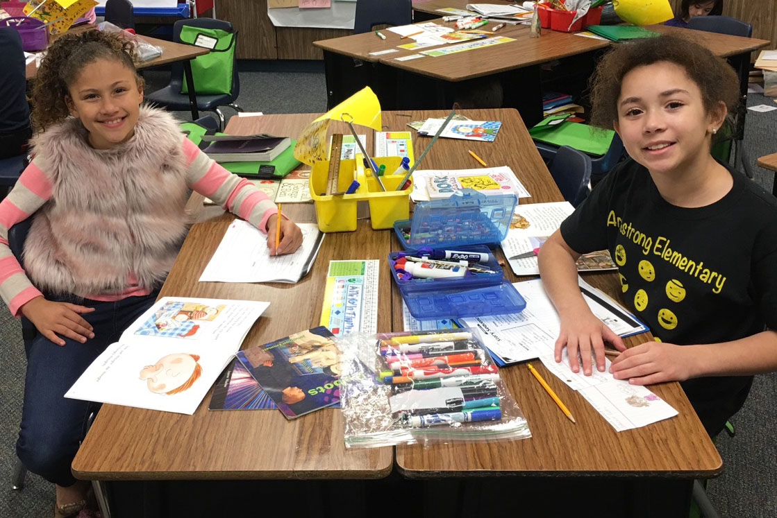 Armstrong Elementary students work together in class.