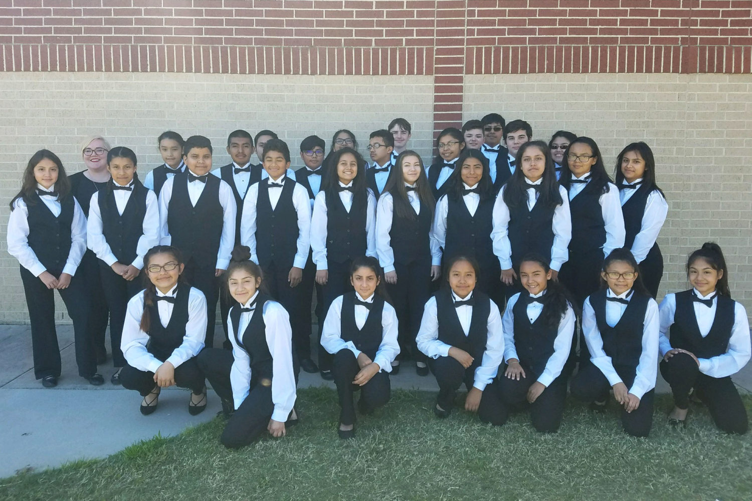 The Washington JH chamber and philharmonic orchestra students pose for a picture at their UIL contest.