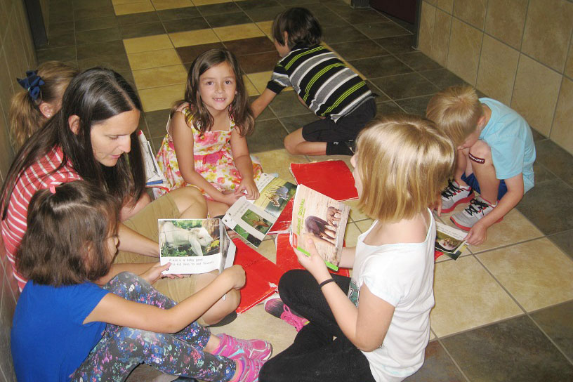Bush Elementary kindergarten students enjoy their reading group.