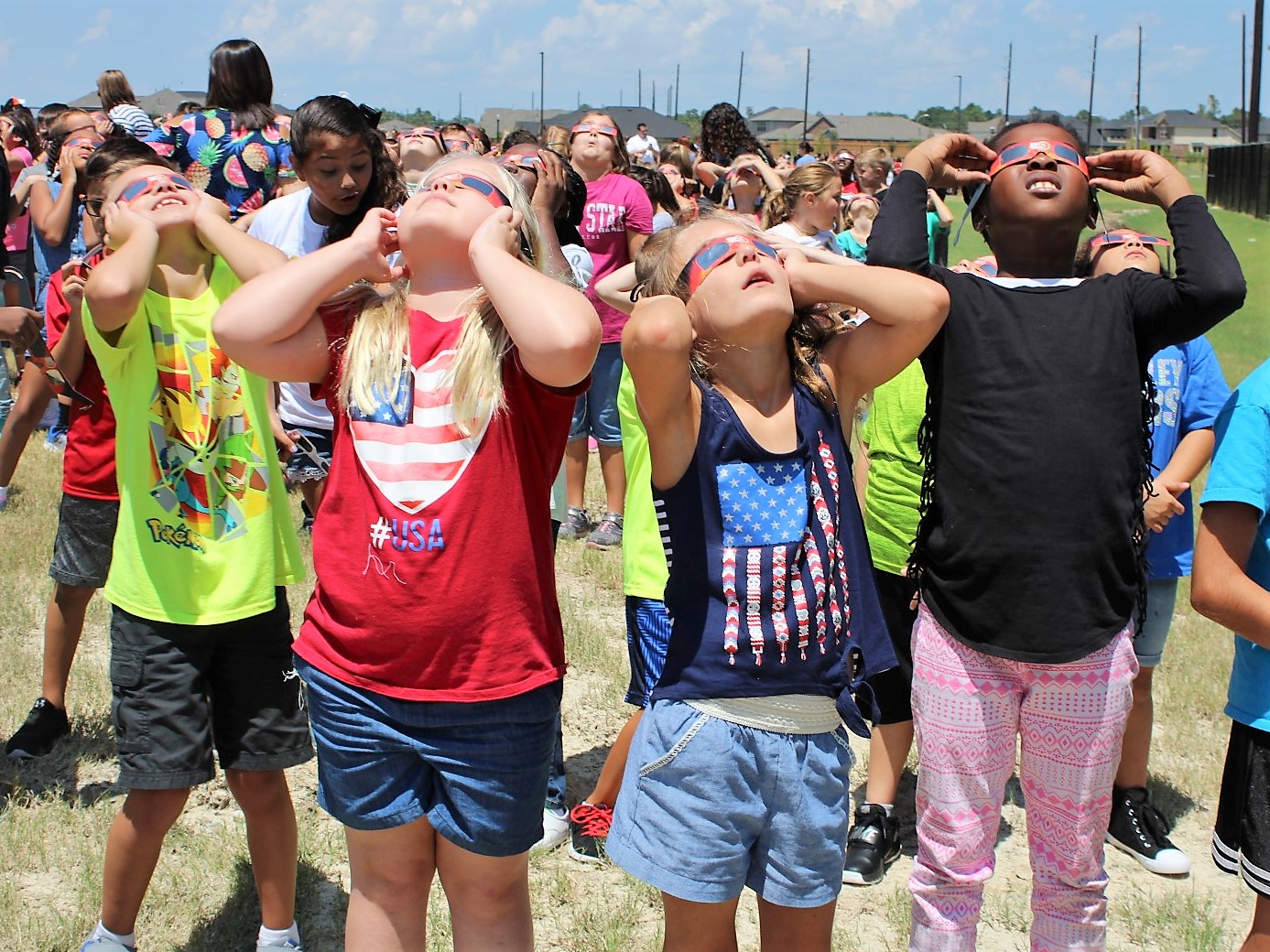 children viewing eclipse