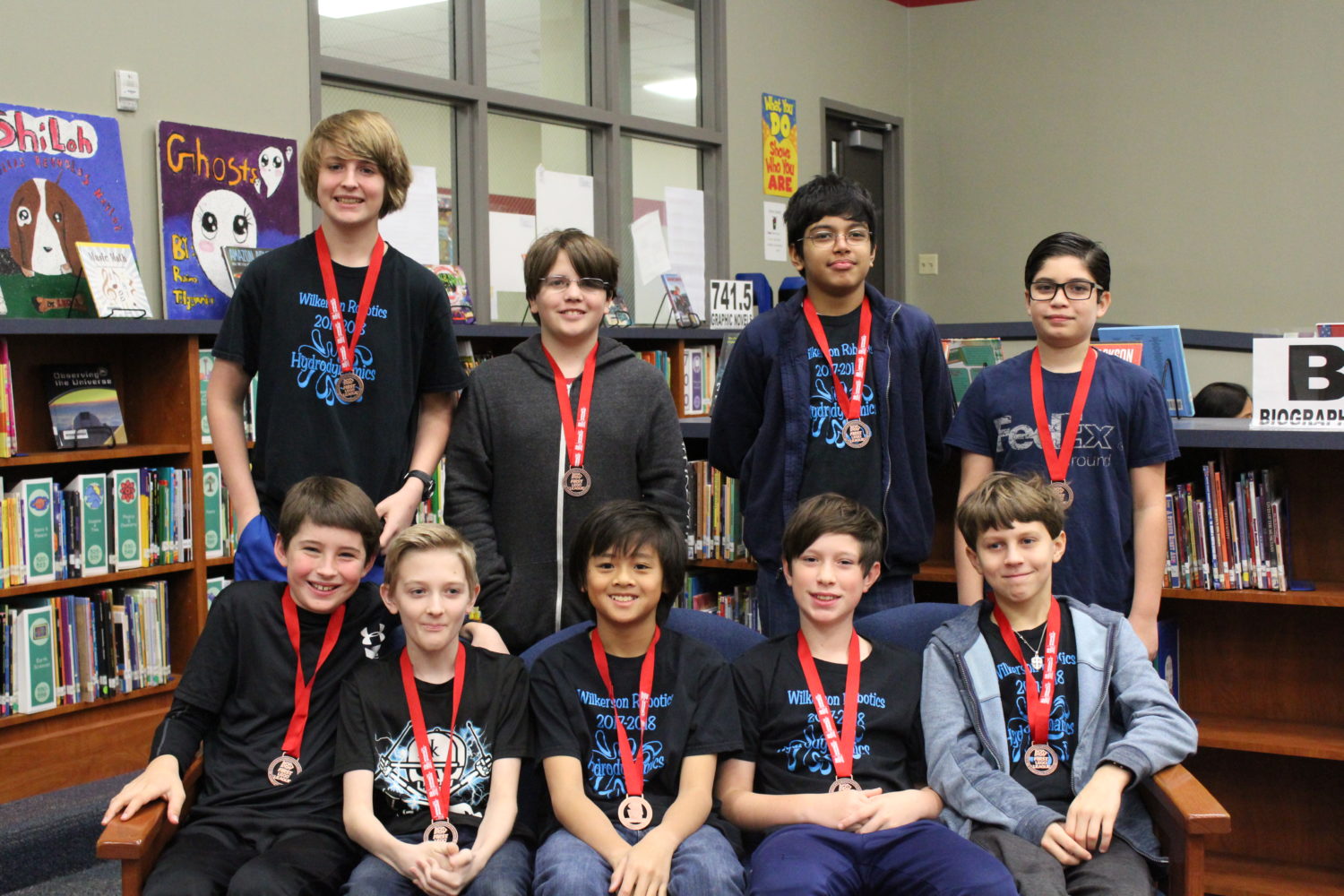 group of boys that competed at a robotics competition