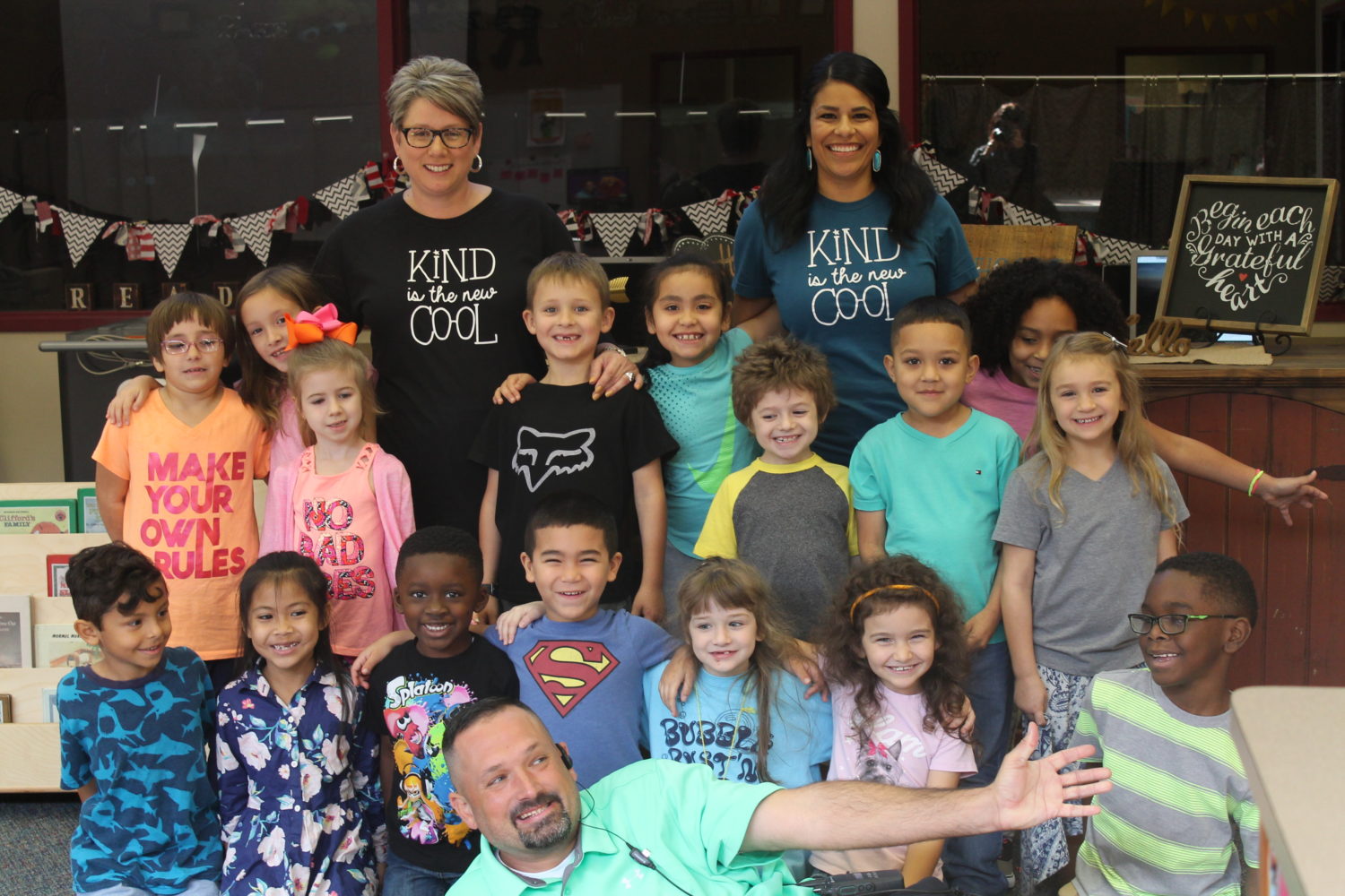 a classroom and their teachers celebrate world kindness day