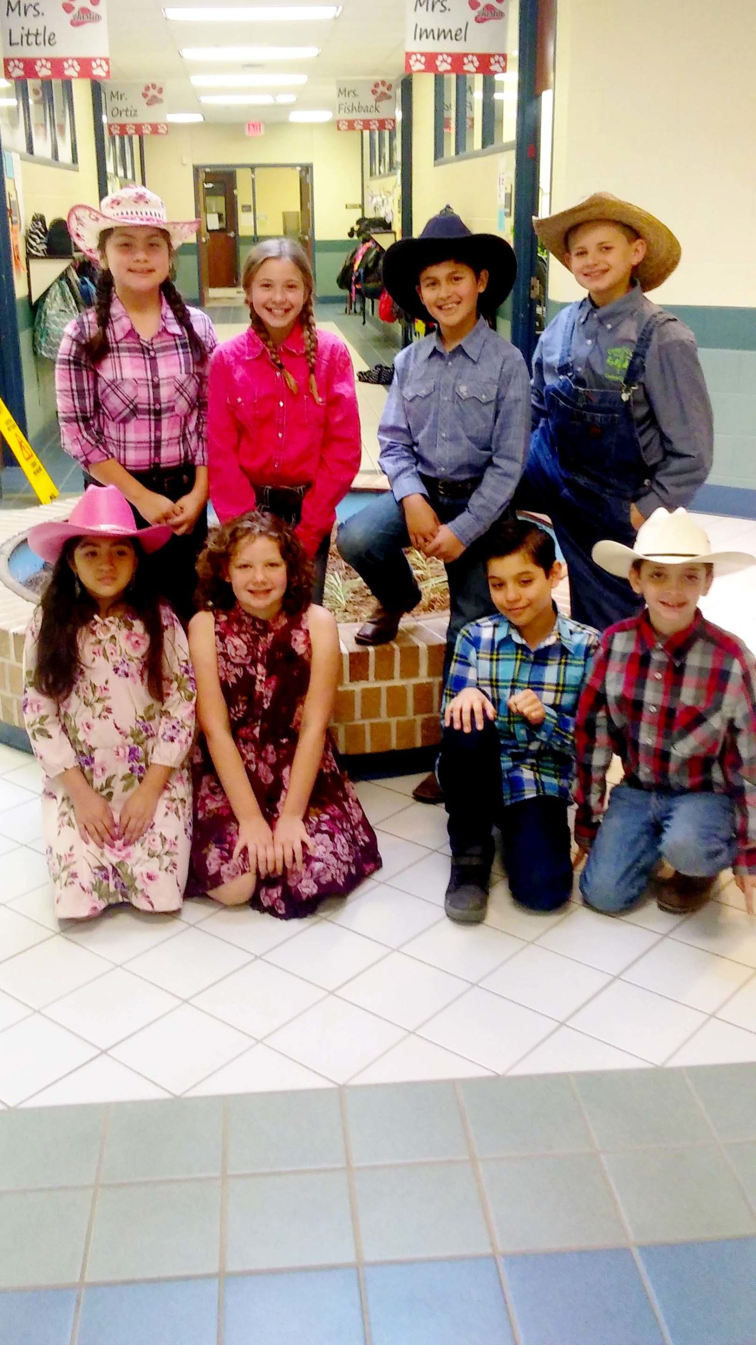 a group of students dress in their western gear
