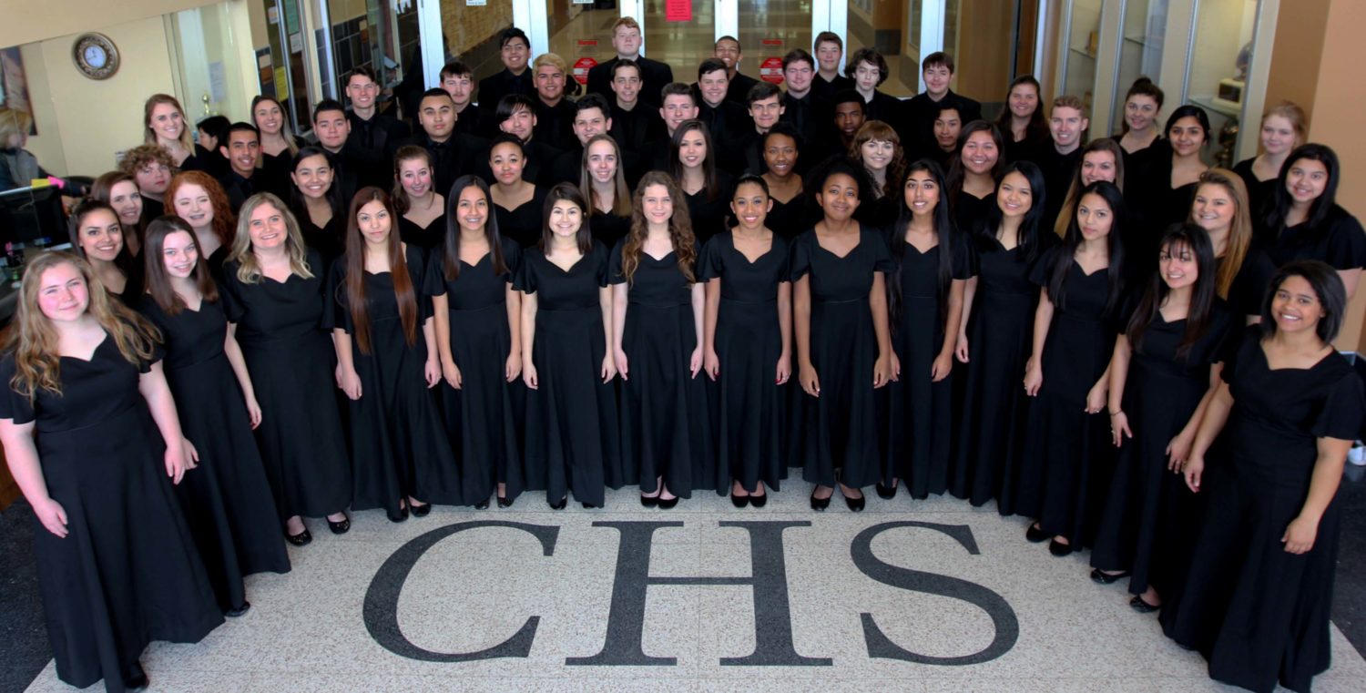 members of the choir pose for a picture