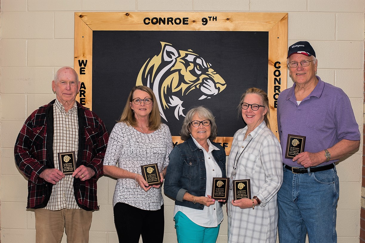 "a group of retired teachers honor current teachers with awards"