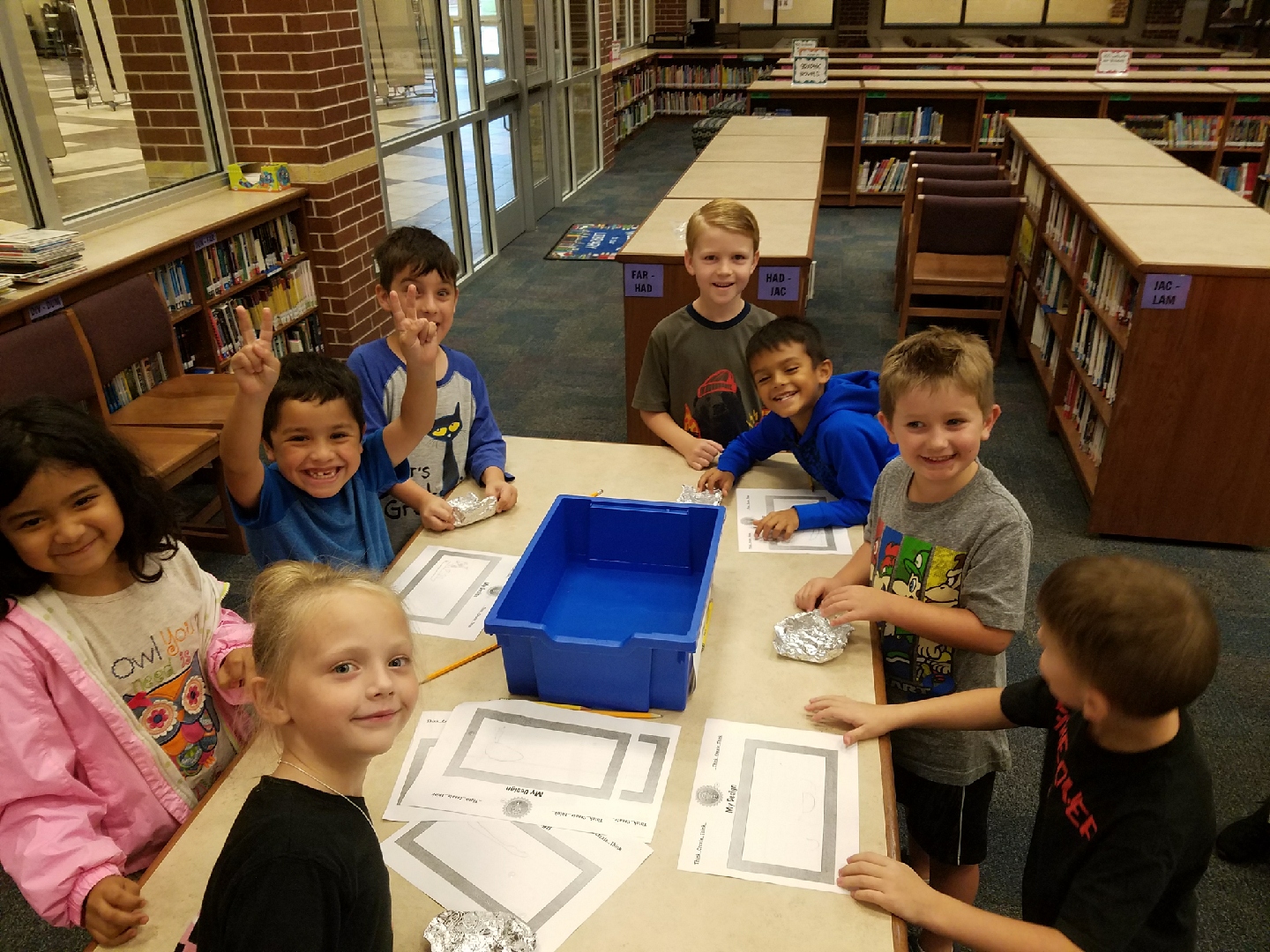 "a group of children work on STEM activities"