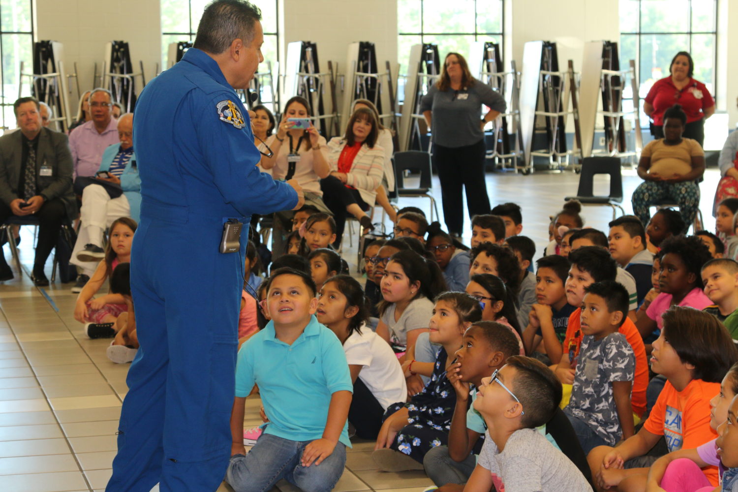 "students listen to an astronaut speak"