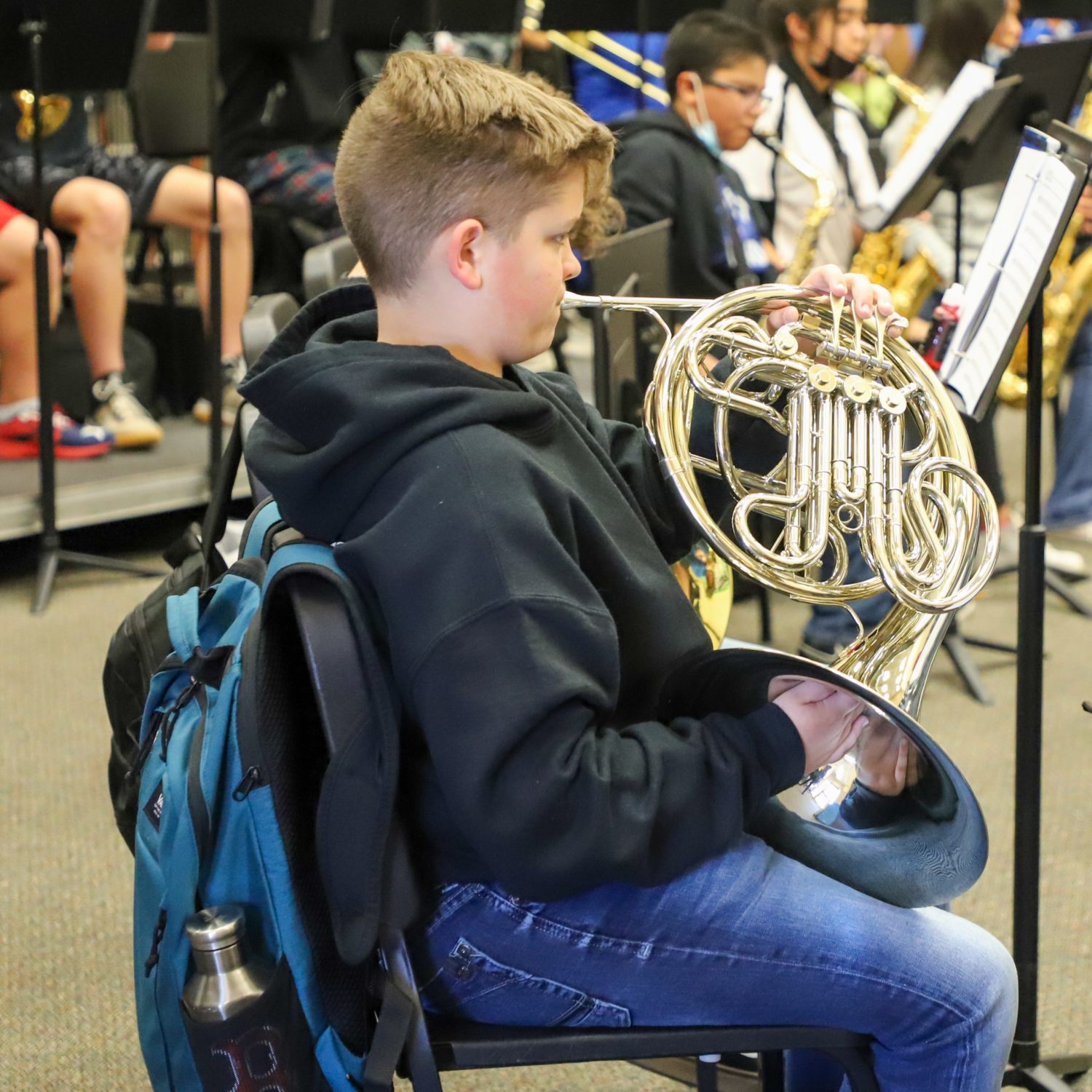 A student practices playing an instrument.