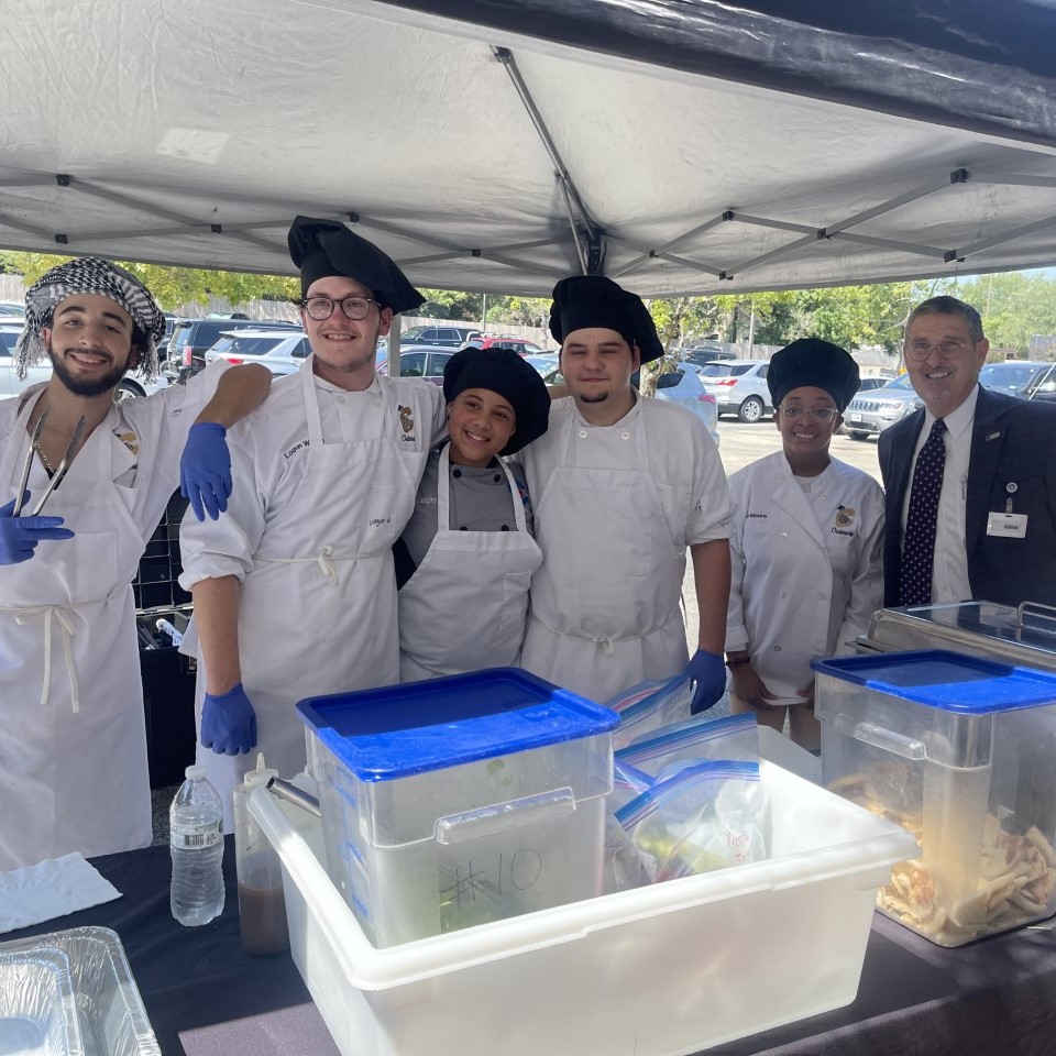 Students from the Conroe HS Culinary Arts Program put their skills to use when they set up their food truck at the administration building last week! 