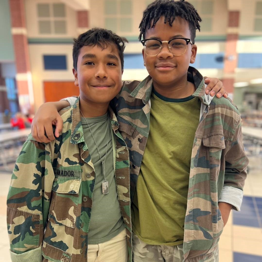 Students at Cox wear matching outfits for Twin Day during Red Ribbon Week.