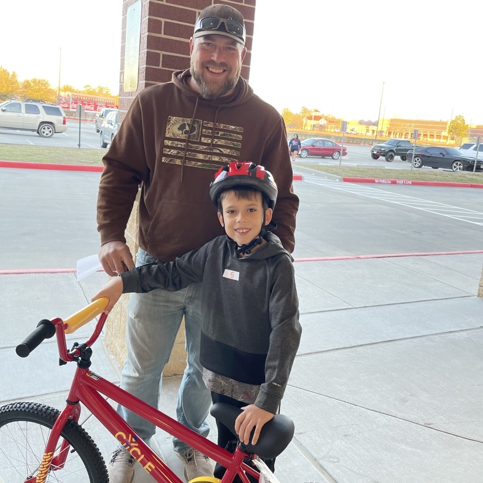 A student at Patterson received a new bike from Cycle Houston to celebrate his reading achievements.