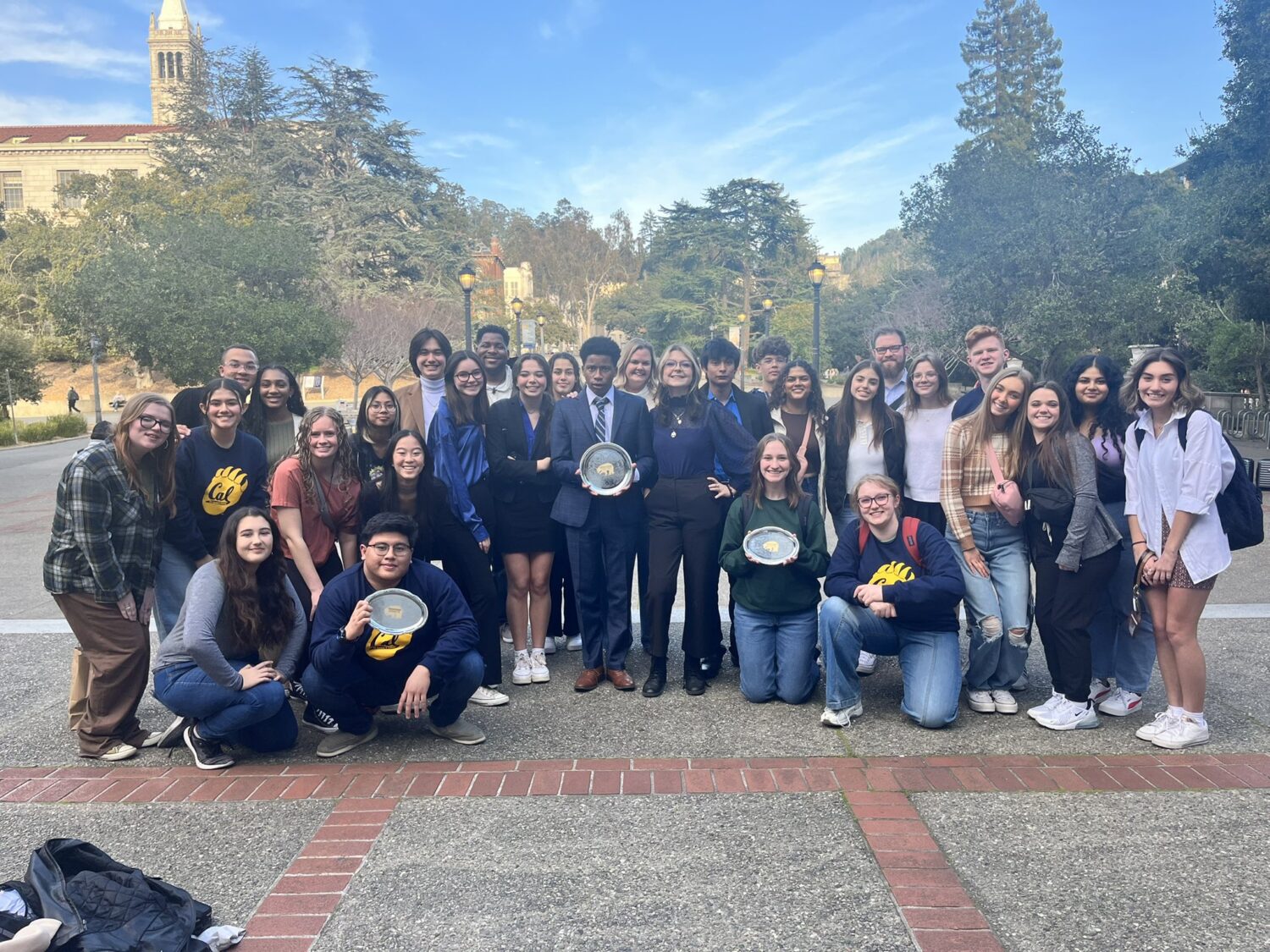 Students from the Grand Oaks Debate team smile at the University of California at Berkeley.