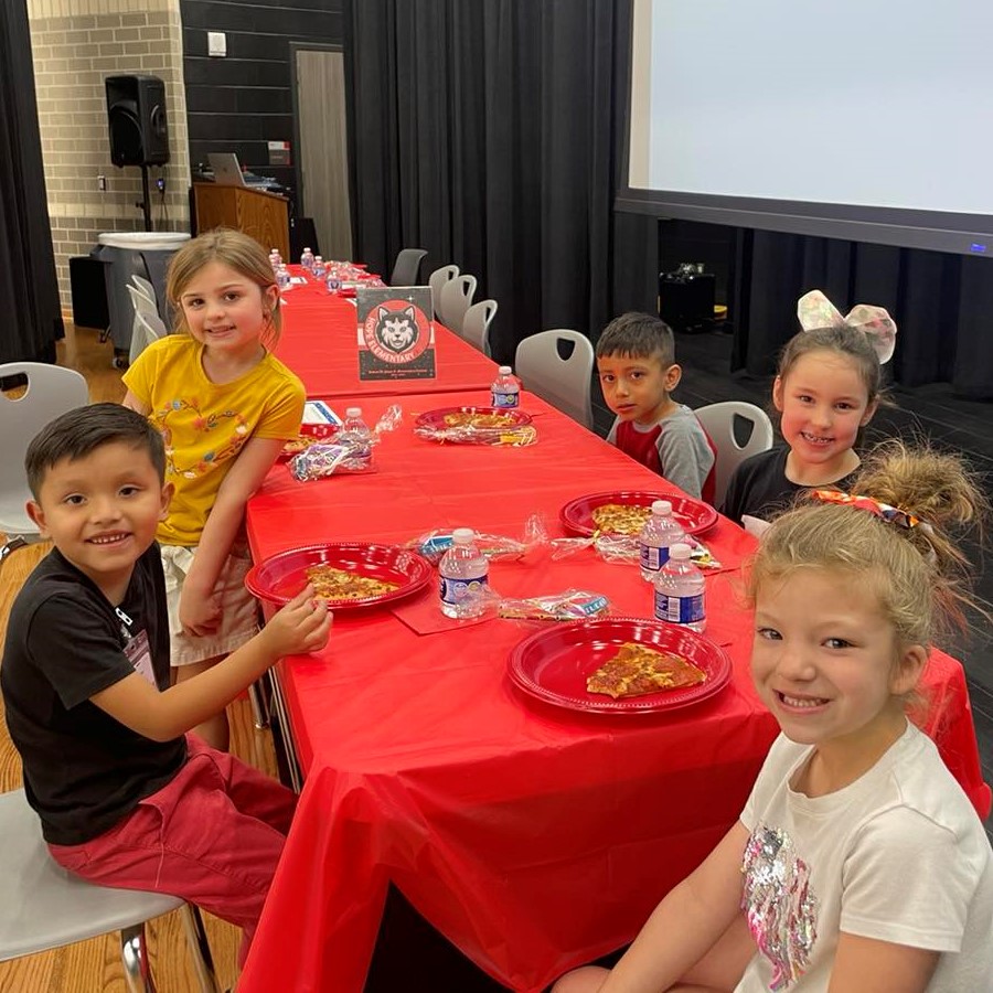 Students at Hope who exhibited kindness eat pizza during a Character Trait Luncheon!