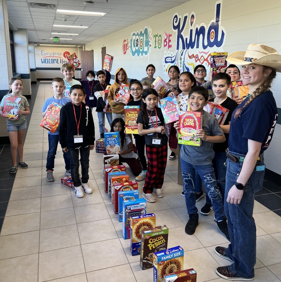 Students at Austin are giving back to their community by collecting 1000 boxes of cereal to donate to the Montgomery County Food Bank!